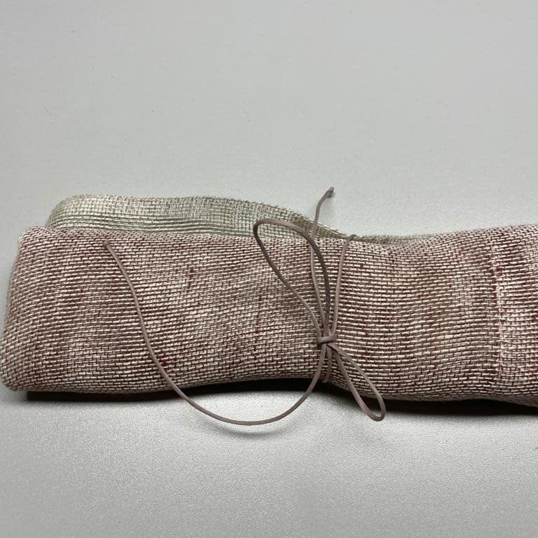 Linen napkin in burnt brick and natural color 50x50 cm